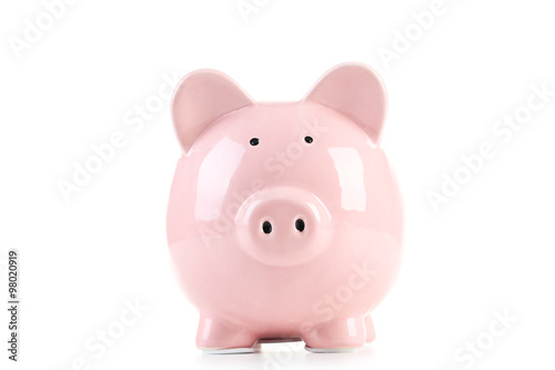Pink piggy bank isolated on a white
