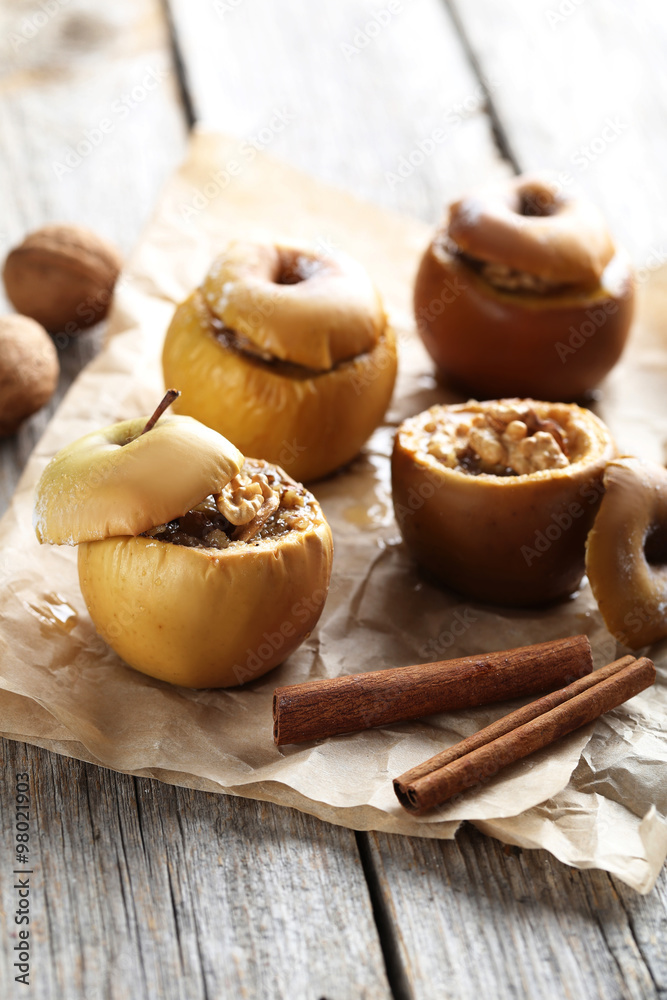 Fototapeta premium Baked apples on grey wooden table