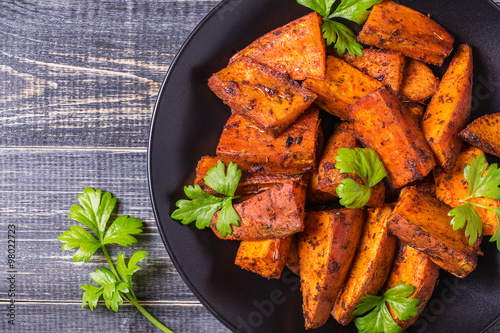 Homemade Cooked Sweet Potato with spices and herbs.