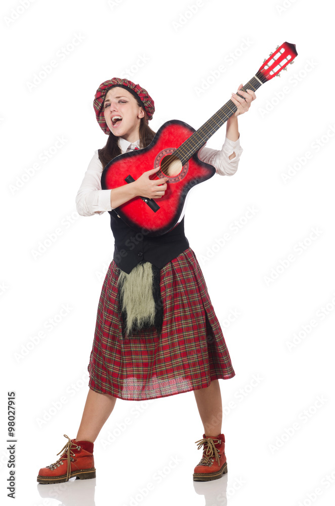 Woman in scottish clothing with guitar Woman in scottish clothing with guitar