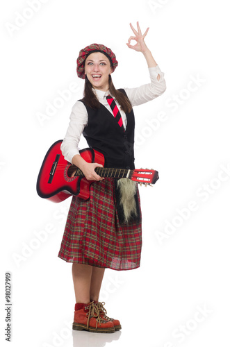 Woman in scottish clothing with guitar