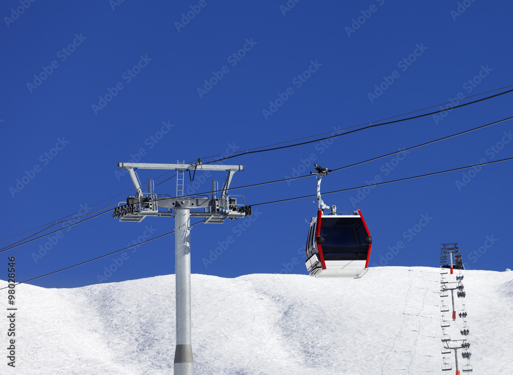 Gondola and chair-lifts at ski resort in nice day Gondola and chair-lifts at ski resort in nice day