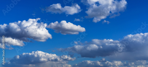 Horizontal vivid blue cloudscape background backdrop © spacedrone808