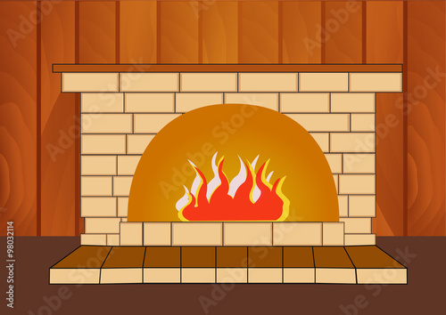 Burning fireplace at home on a wooden background