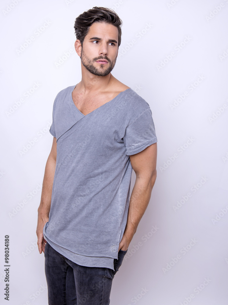 handsome young and fit man posing in casual clothes handsome young and fit man posing in casual clothes