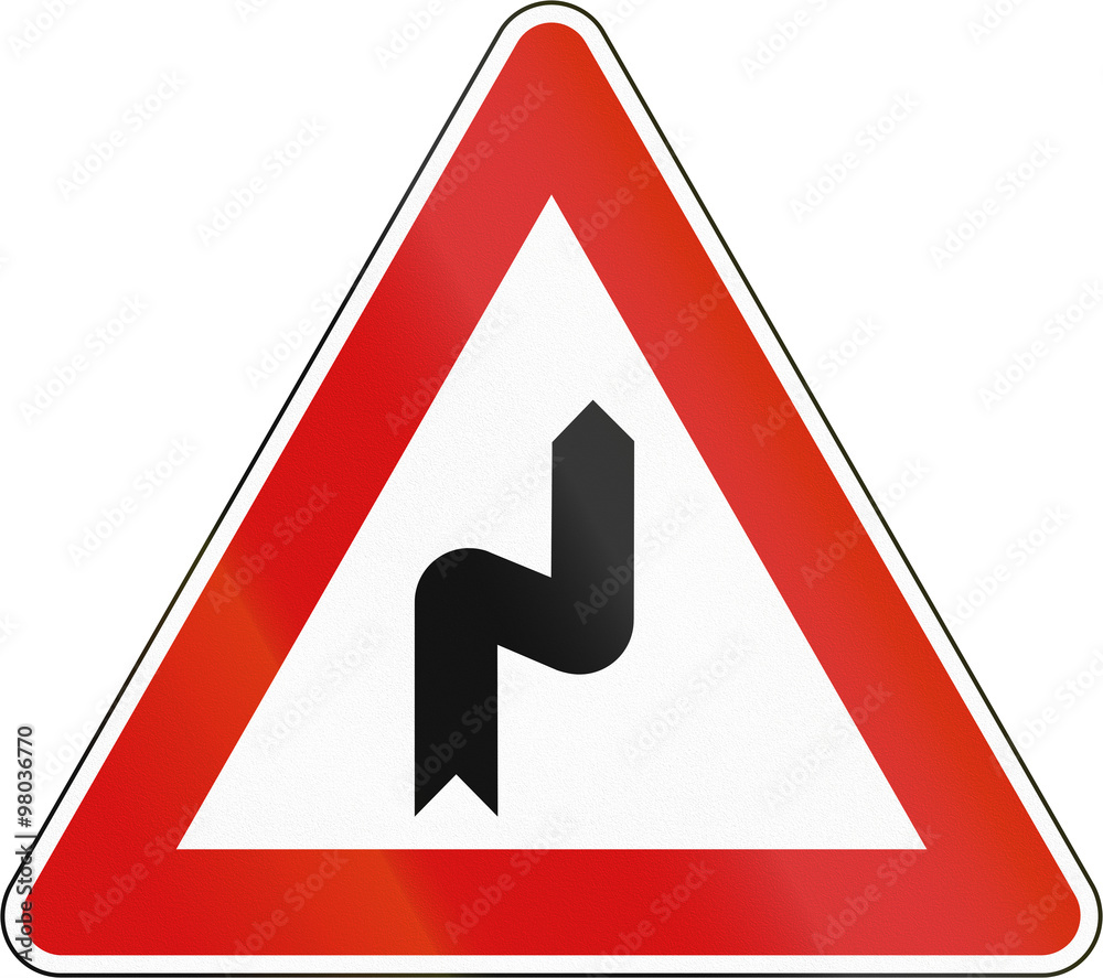 Slovenia road sign - Double bend, first to right Slovenia road sign - Double bend, first to right