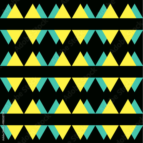 Seamless vintage abstract pattern with triangles in the style of 80's. Fashion background in Memphis.