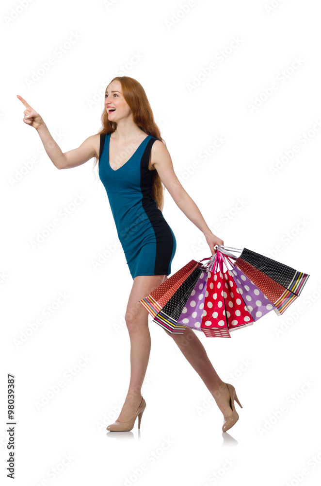 Woman with shopping bags isolated on white Woman with shopping bags isolated on white