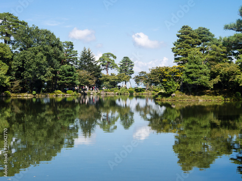 Fototapeta Naklejka Na Ścianę i Meble -  Kanazawa, Japan - September 28, 2015: Kasumi pond in Kenrokuen garden