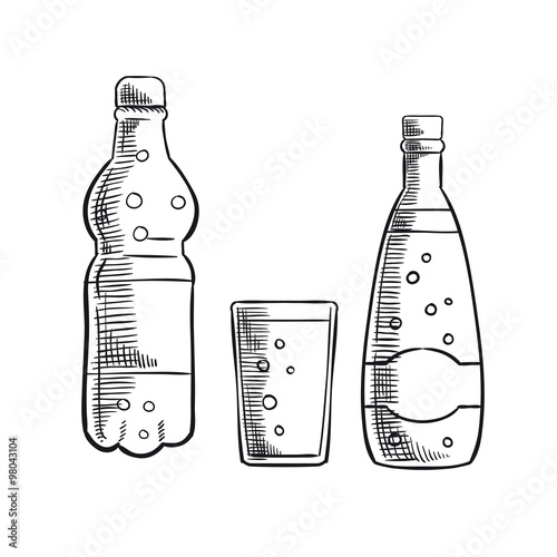 Bottles and glass of sweet soda drink