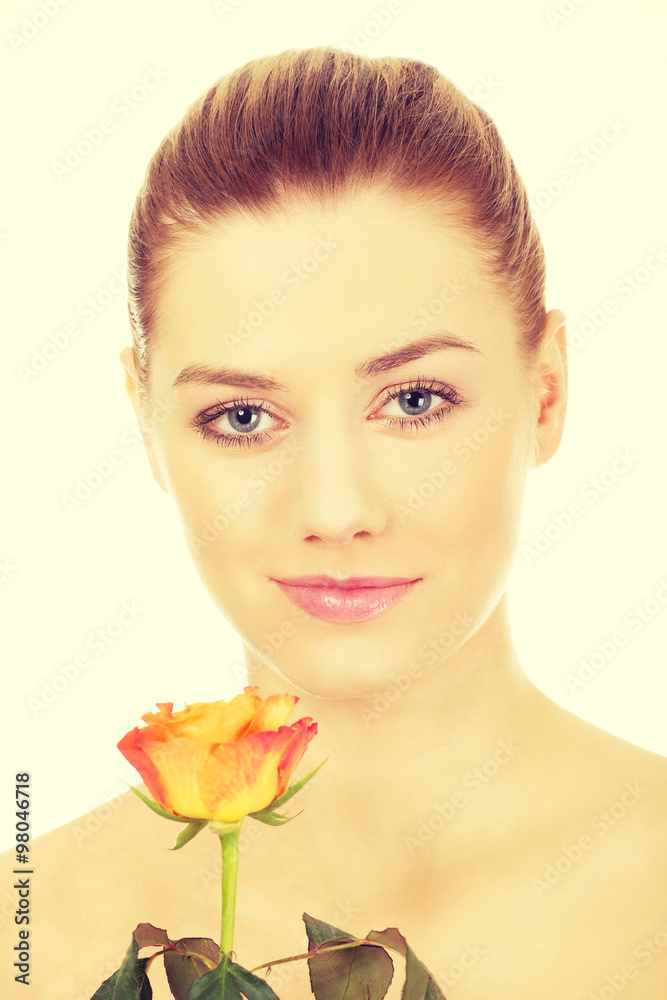 Smiling woman with fresh rose. Smiling woman with fresh rose.