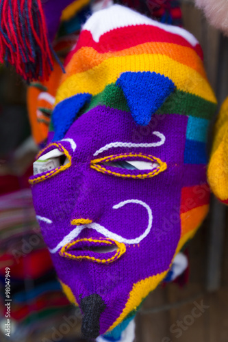 Colored woolen mask for sale at the market in Cusco, Peru