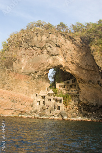 Abandon Art Colony at Adams Bay on thge island of Bequia, Grenadines. Unique tourist destination builted in the 60's, The arch is also refered to as the Moonhole photo