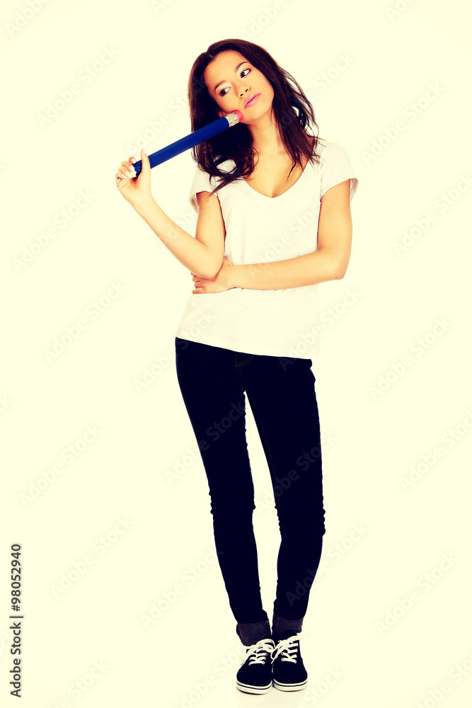 Thoughtful woman with big pencil. Thoughtful woman with big pencil.