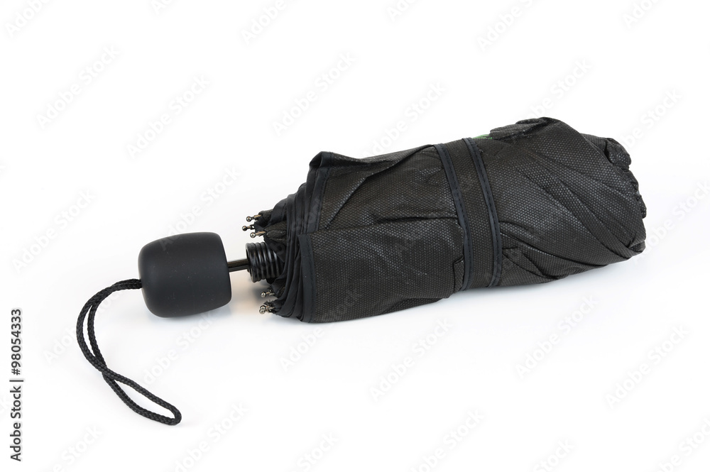 single folded black umbrella on white background single folded black umbrella on white background