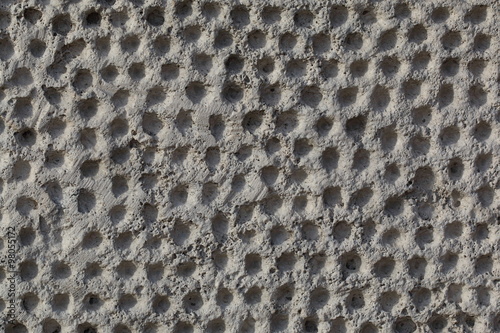 Photography The pattern from a dots on a old stone wall