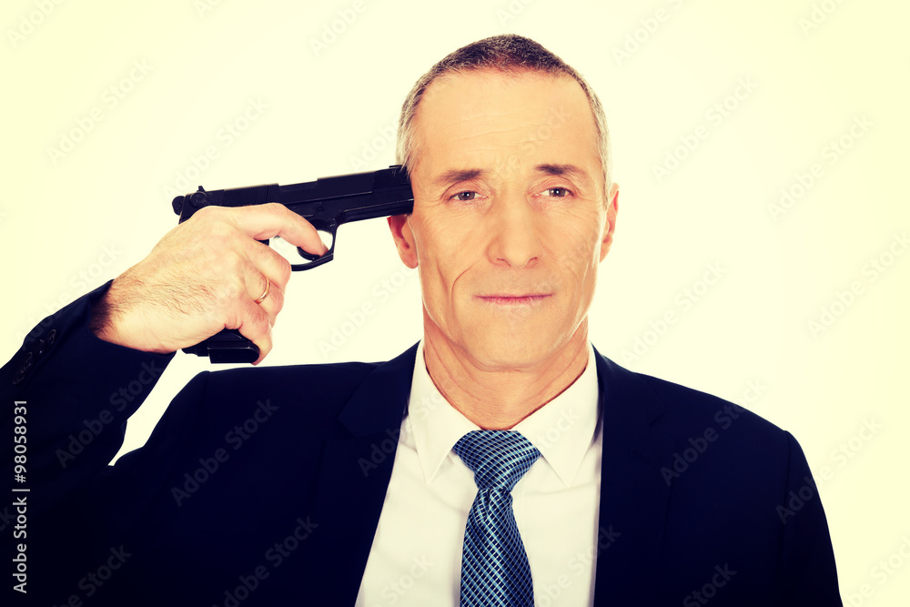 Naklejka premium Portrait of a man with handgun near head