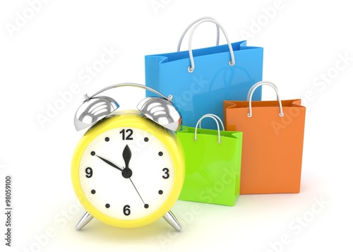 alarm clock and shopping bag (time to buy concept)