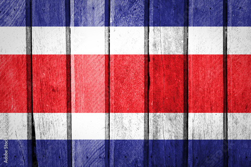 Costa Rica flag on old wood background