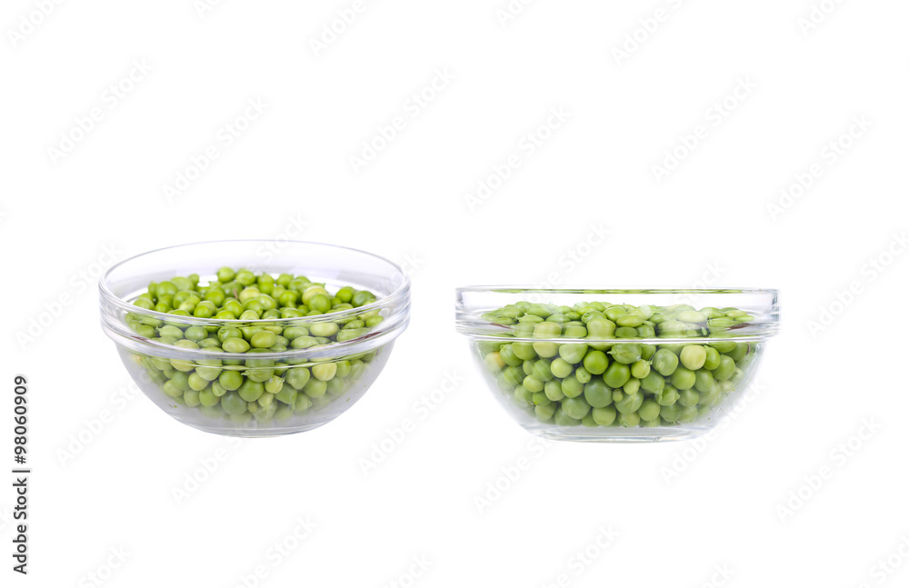 Fresh garden peas in a glass bowl. Fresh garden peas in a glass bowl.
