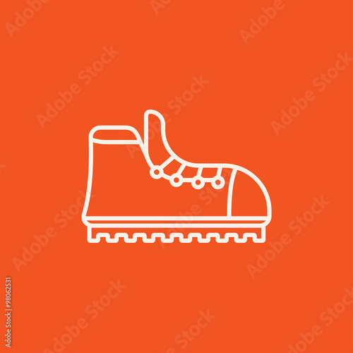 Hiking boot with crampons line icon.