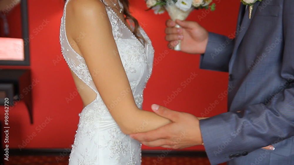 Handsome groom is seeing first the beauty bride in the morning. Handsome groom is seeing first the beauty bride in the morning.