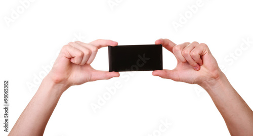 Mobile phone in male hand isolated on white background