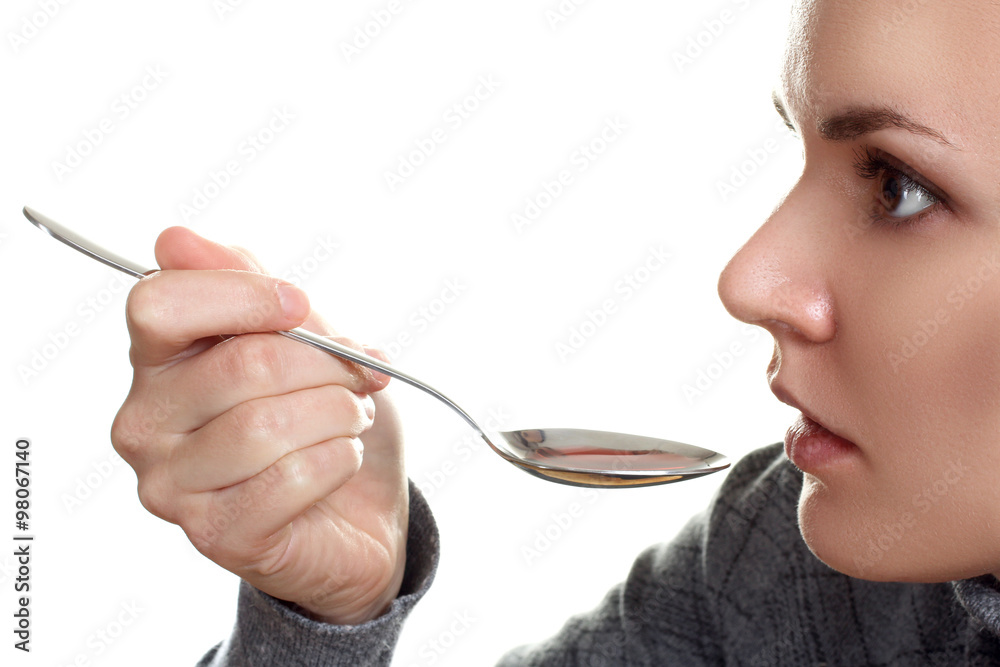 the woman with the cure for throat isolated on white background the woman with the cure for throat isolated on white background