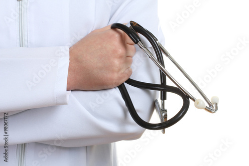 doctor in white coat with phonendoscope on a white isolated background