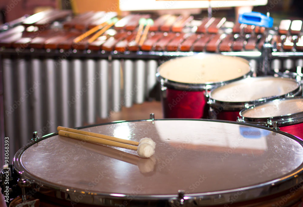 Percussion instruments in a chamber hall. Drums. Marimba. Bass. Jazz. intimate lighting
Percussion instruments in a chamber hall. Drums. Marimba. Bass. Jazz. intimate lighting