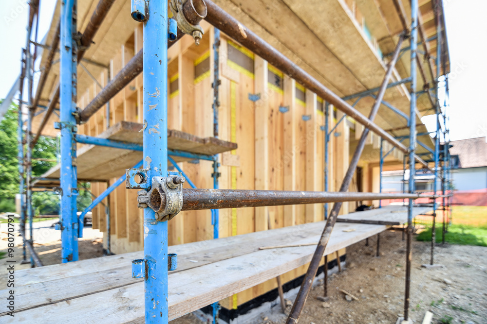 scaffold on a residential hard wood passive house scaffold on a residential hard wood passive house