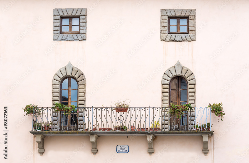 Architectural symmetry in the square of the Collegiate in Castiglione Fiorentino, a medieval town in Tuscany, Italy
