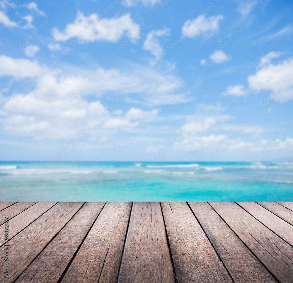 Wood plank with blue sea background Wood plank with blue sea background