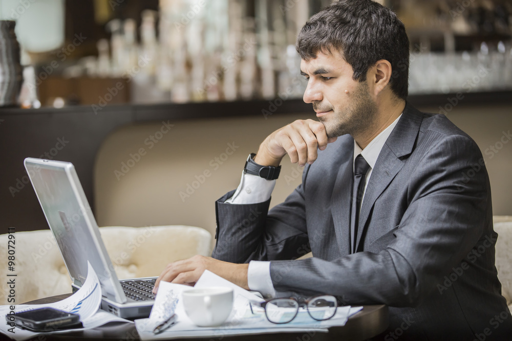businessman freelancer working at the coffee shop