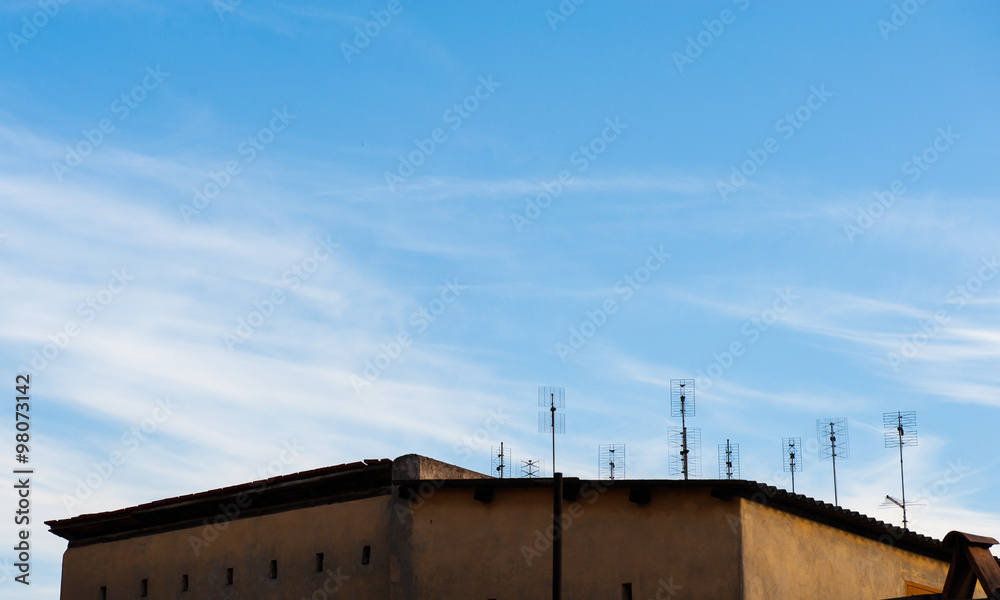 Group of old terrestrial tv antennas on roof Group of old terrestrial tv antennas on roof