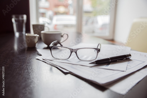 business still life points, graphs and diagrams documents on the table