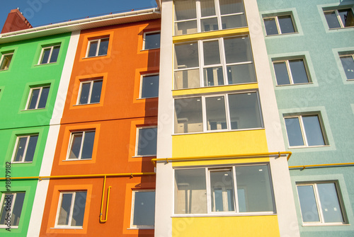new multistory residential building in the background