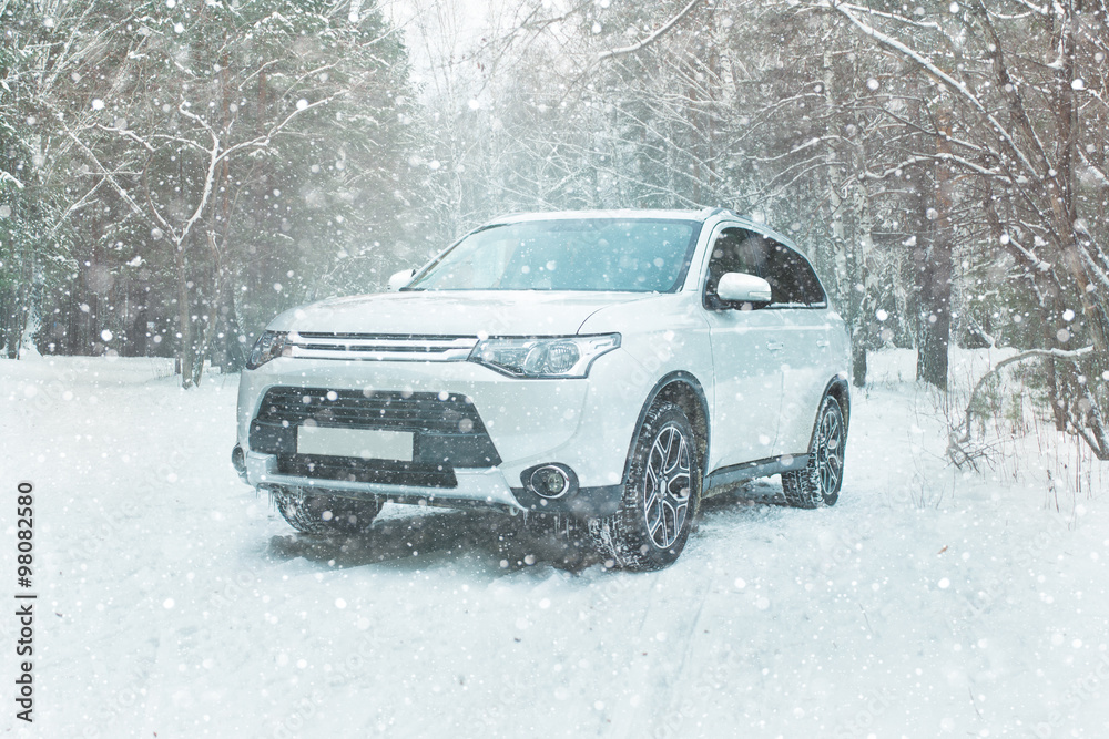 Winter driving. Off-road riding on winter forest snowy road Winter driving. Off-road riding on winter forest snowy road