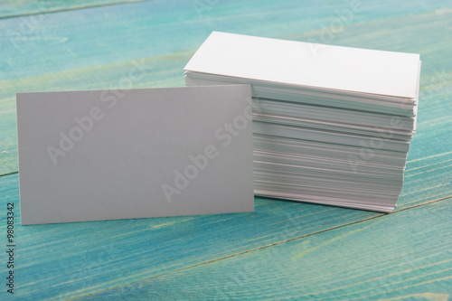 Fototapeta Naklejka Na Ścianę i Meble -  White blank business visit card, gift, ticket, pass, present on wooden background