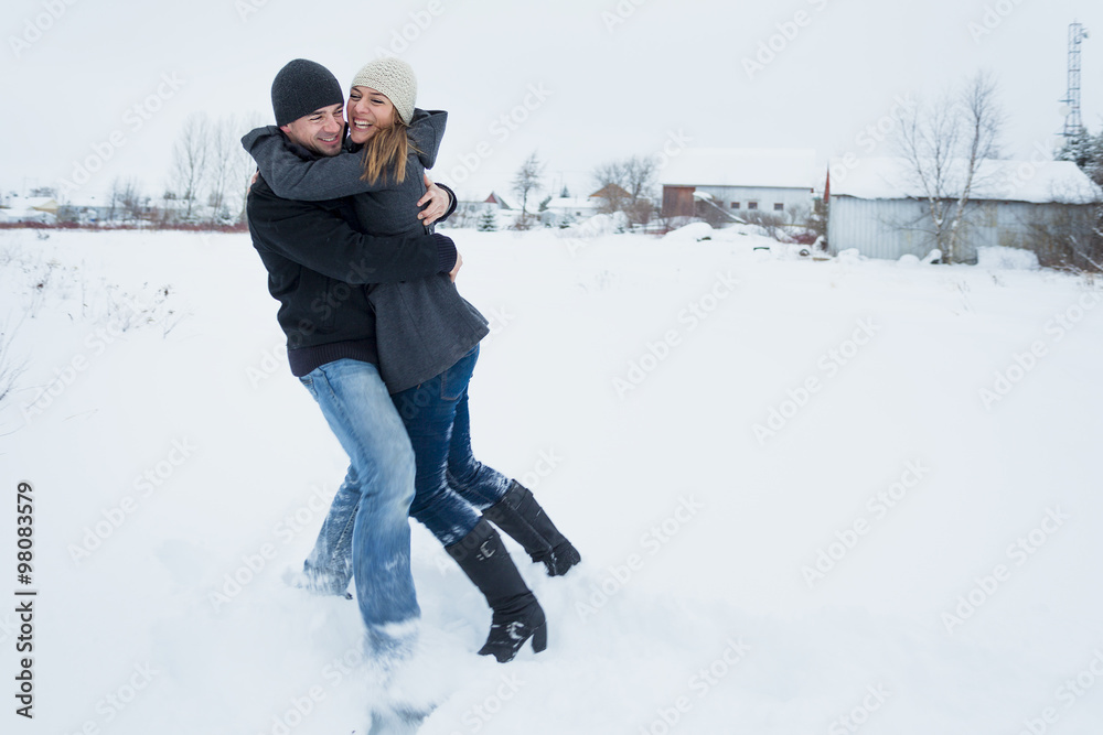 Young Couple outside in the winter season