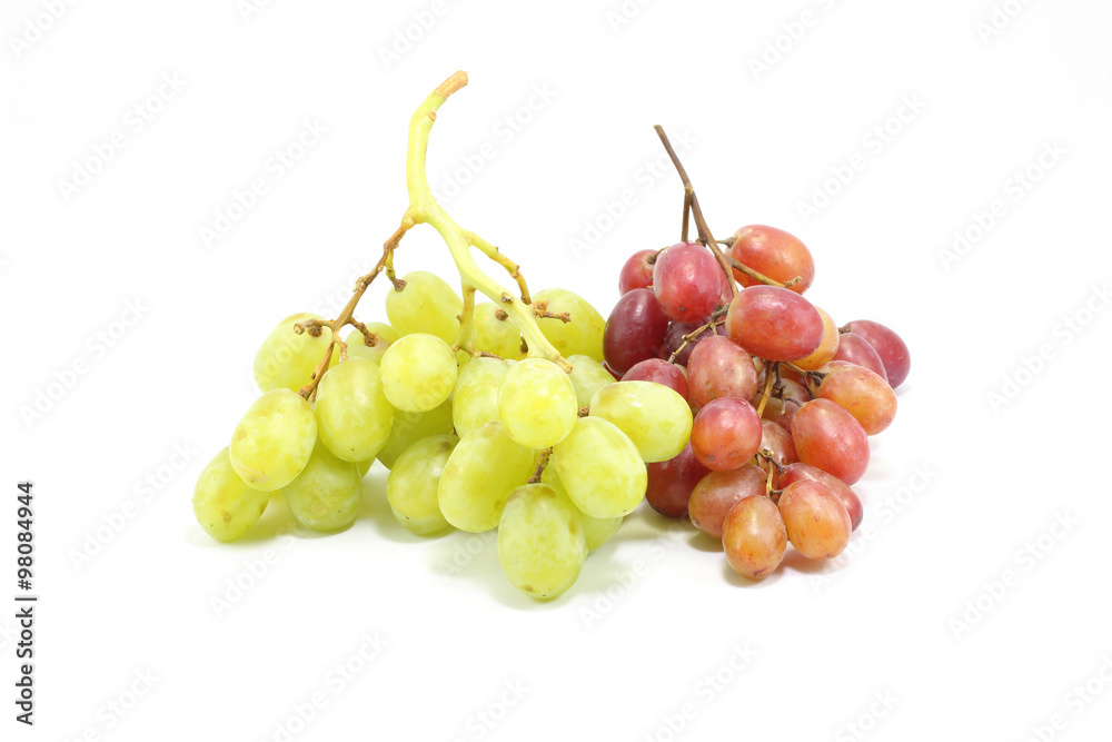 Red and green bunch grapes on white background