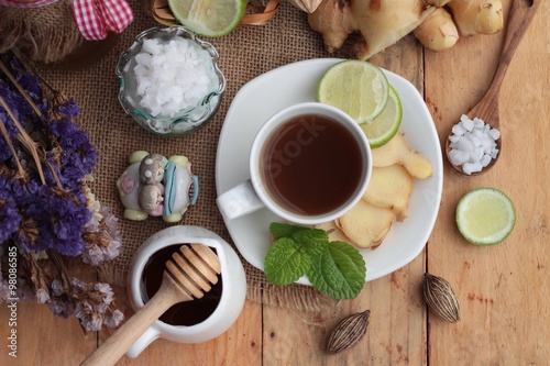 Fototapeta Naklejka Na Ścianę i Meble -  Ginger tea with lemon and honey delicious.
