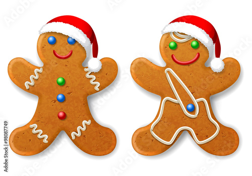 A set of Christmas gingerbread man in a Santa hat, decorated with icing, isolated on white