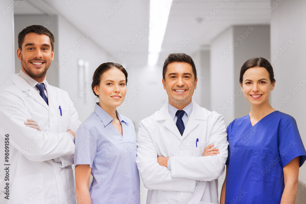 happy group of medics or doctors at hospital happy group of medics or doctors at hospital