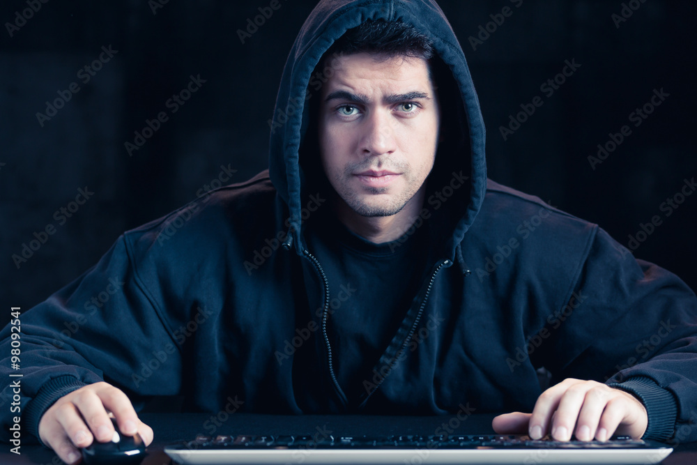 Young cyber warior in hoody Young cyber warior in hoody
