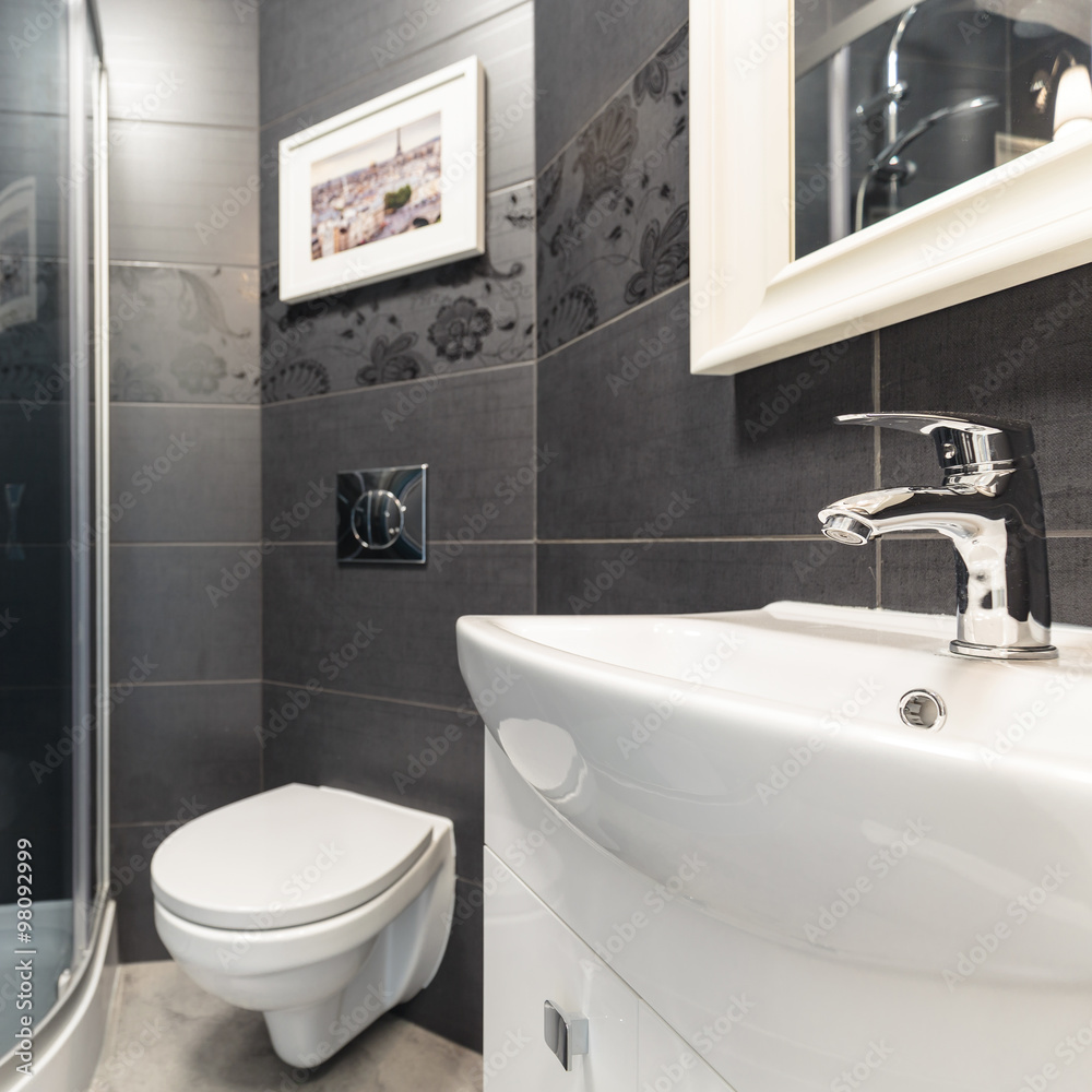 Fototapeta premium Black tiles in contemporary toilet