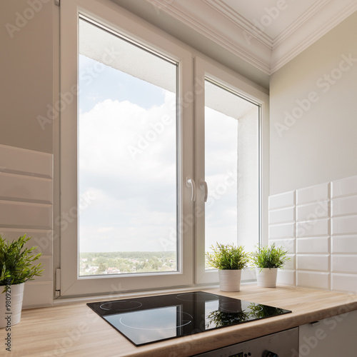 Bright kitchen overlooking neighborhood