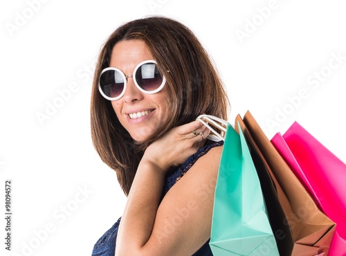 Woman with many shopping bags
