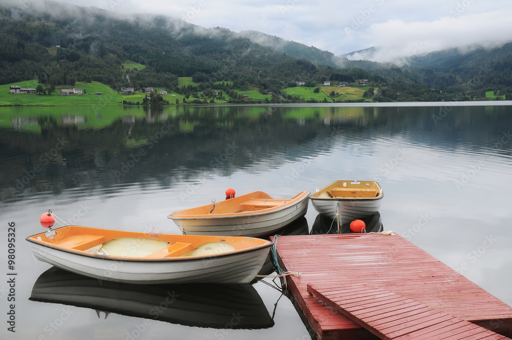 Three boats on lake in Western Norway