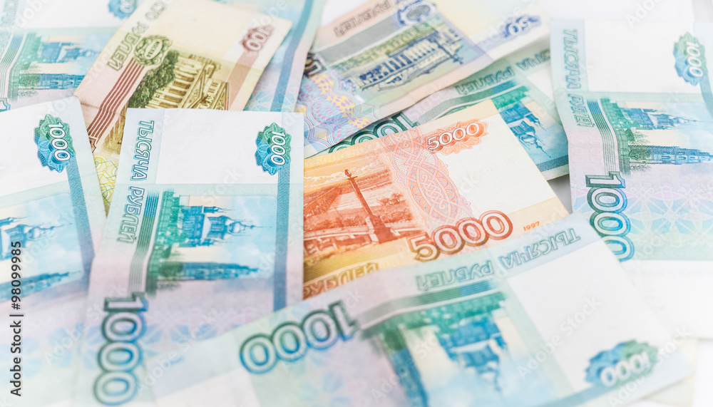 Russian money background. Ruble banknotes of different denominations Russian money background. Ruble banknotes of different denominations